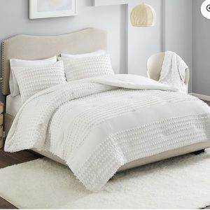 New in bag twin/twin xl comforter off white